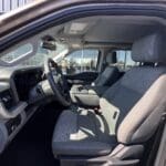 A truck with grey seats and gray leather.